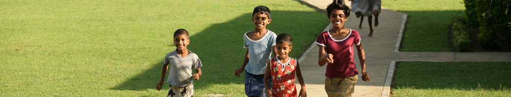 Sponsored boys and girls running in the SOS Village in Sri Lanka - Sponsor a child today